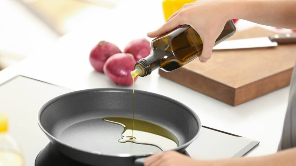 Different types of cooking oils are used in kitchens for frying, baking, and salad dressings.