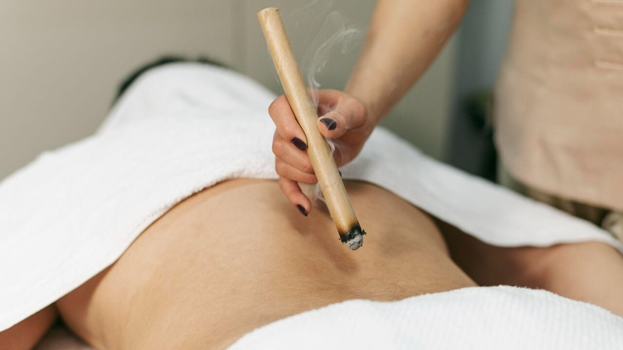 Moxibustion Therapy uses soothing heat to enhance circulation and relieve pain naturally.